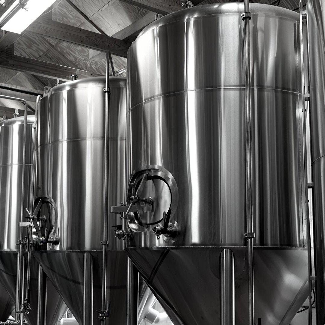 How is beer stabilized in a brewery?